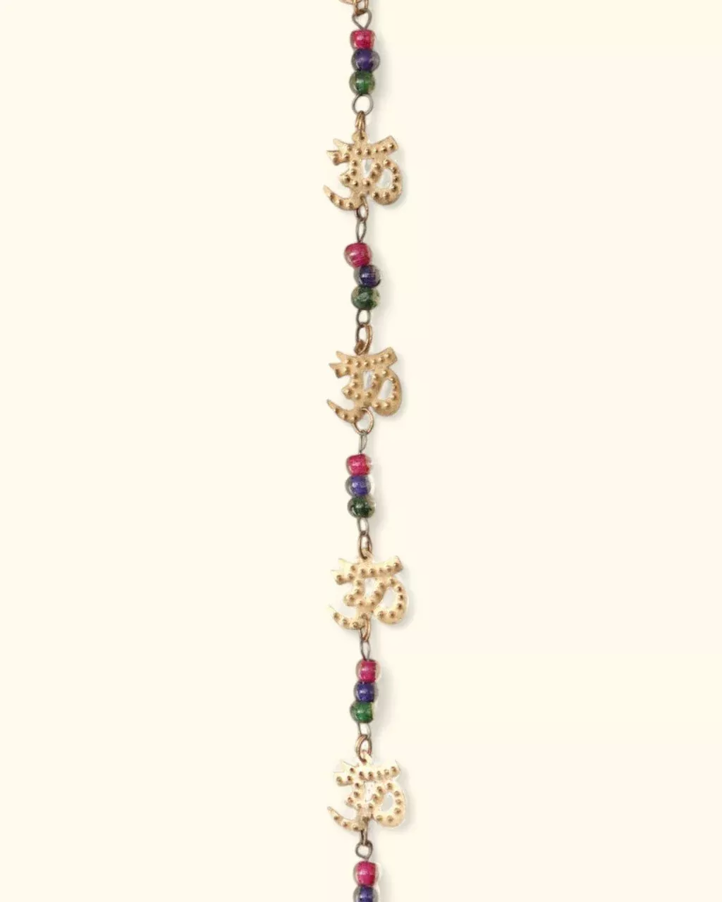 Seven Om Symbol Wall Hanging With Bell